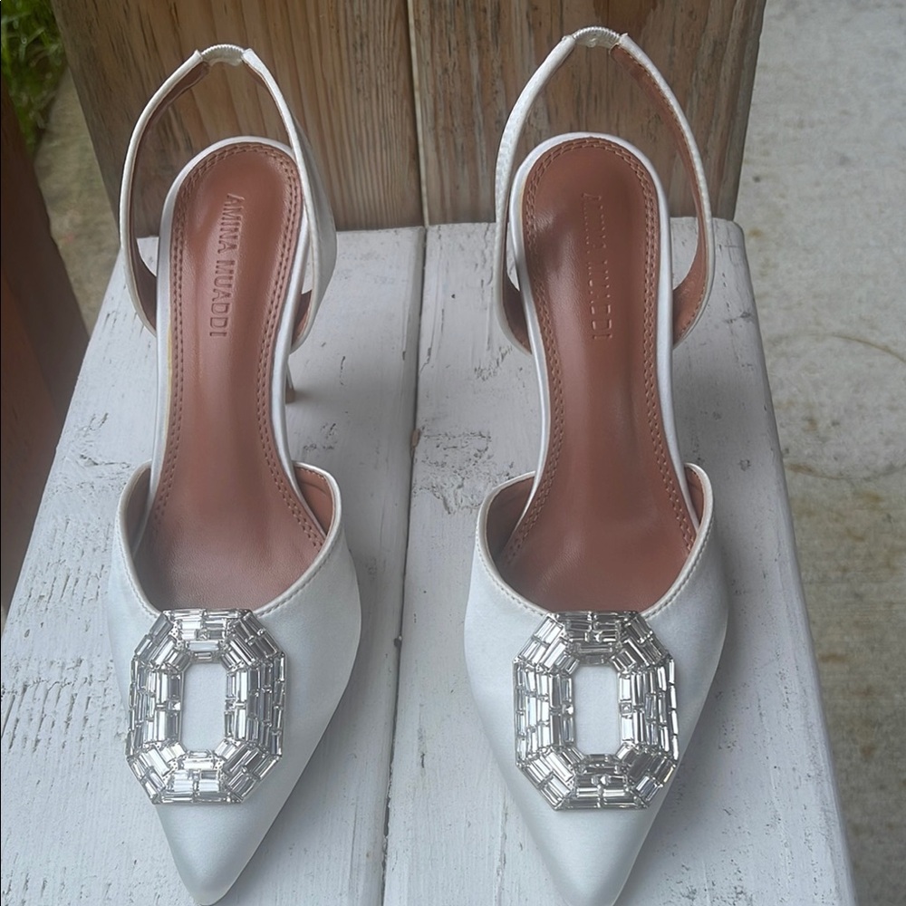 Amina Muaddi White Satin Pointed Toe Slingback Heels with Crystal Buckle